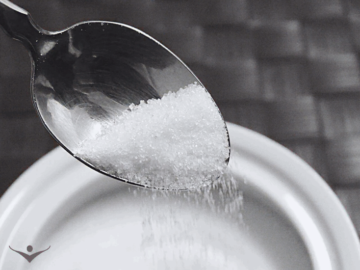 bowl of sugar with spoon
